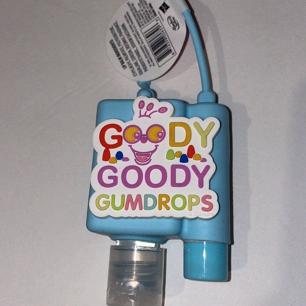 Candyland carrying case with hand sanitizer and lip balm